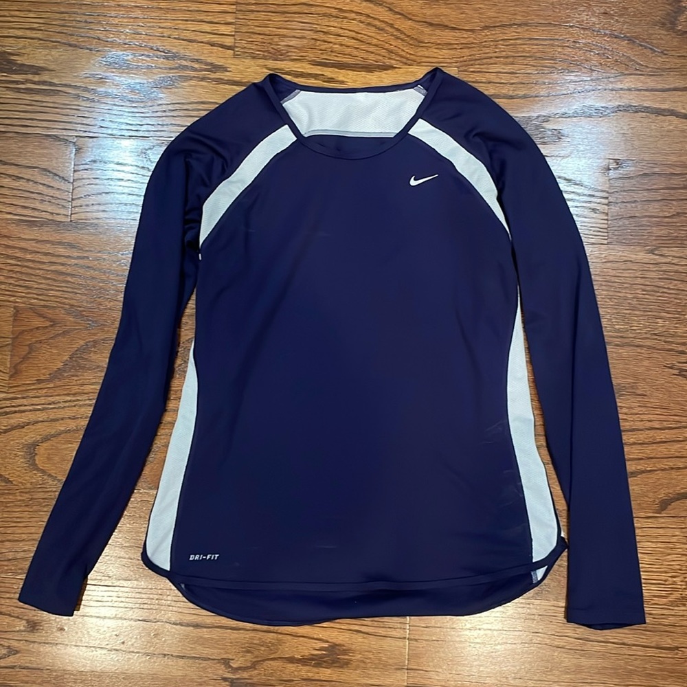 Nike Dri-Fit long sleeve lightweight vented running shirt in purple and white.